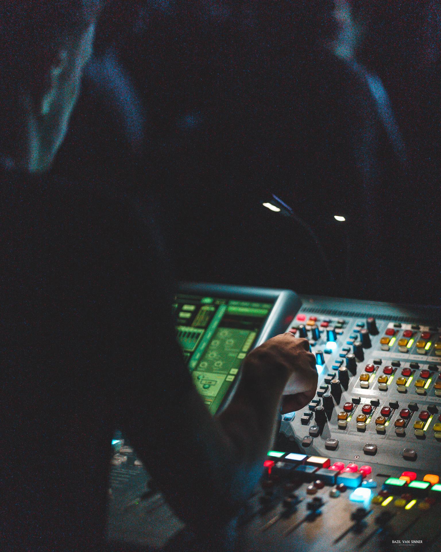 Sound Engineer mixing on a Midas Pro 2C live audio console